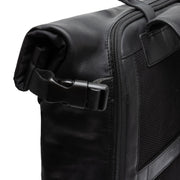 
Solid Antique Brass Hardware & Heavy-Duty Dual Zipper Detail on Bornholm Vollnarbenleder Roll-top Backpack