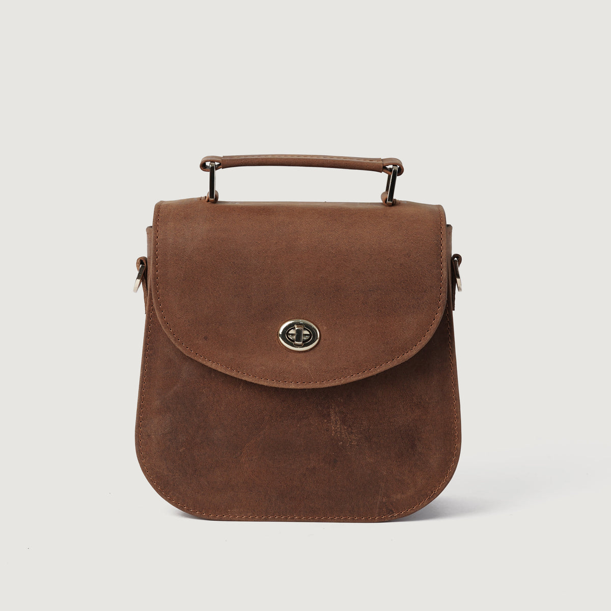 
The Sandra Vintage Hellbraun Leather Saddle Bag For Women - Strukturierte Seitenansicht mit Faltentiefe & Erweiterungsvolumen